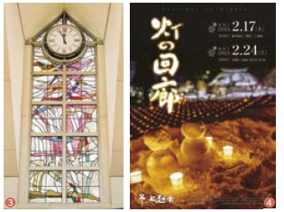 高田駅入口のステンドグラスと「灯の回廊」ポスター（画像）
