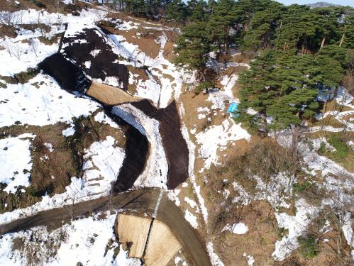 災害復旧現場の空撮・拡大（写真）