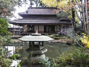 懐徳亭と日本庭園（写真）
