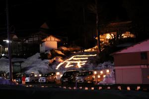 安塚区小黒（専敬寺前）　「辰」の大文字（写真）