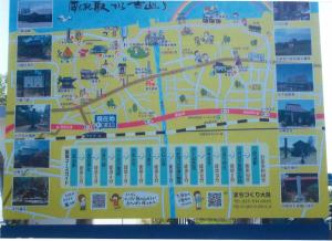犀潟駅前の案内看板（写真）