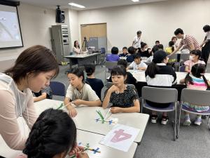 飾り帯作り（写真）