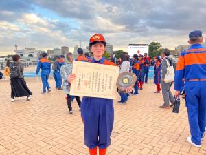 優秀選手賞を受賞した佐藤団員（写真）