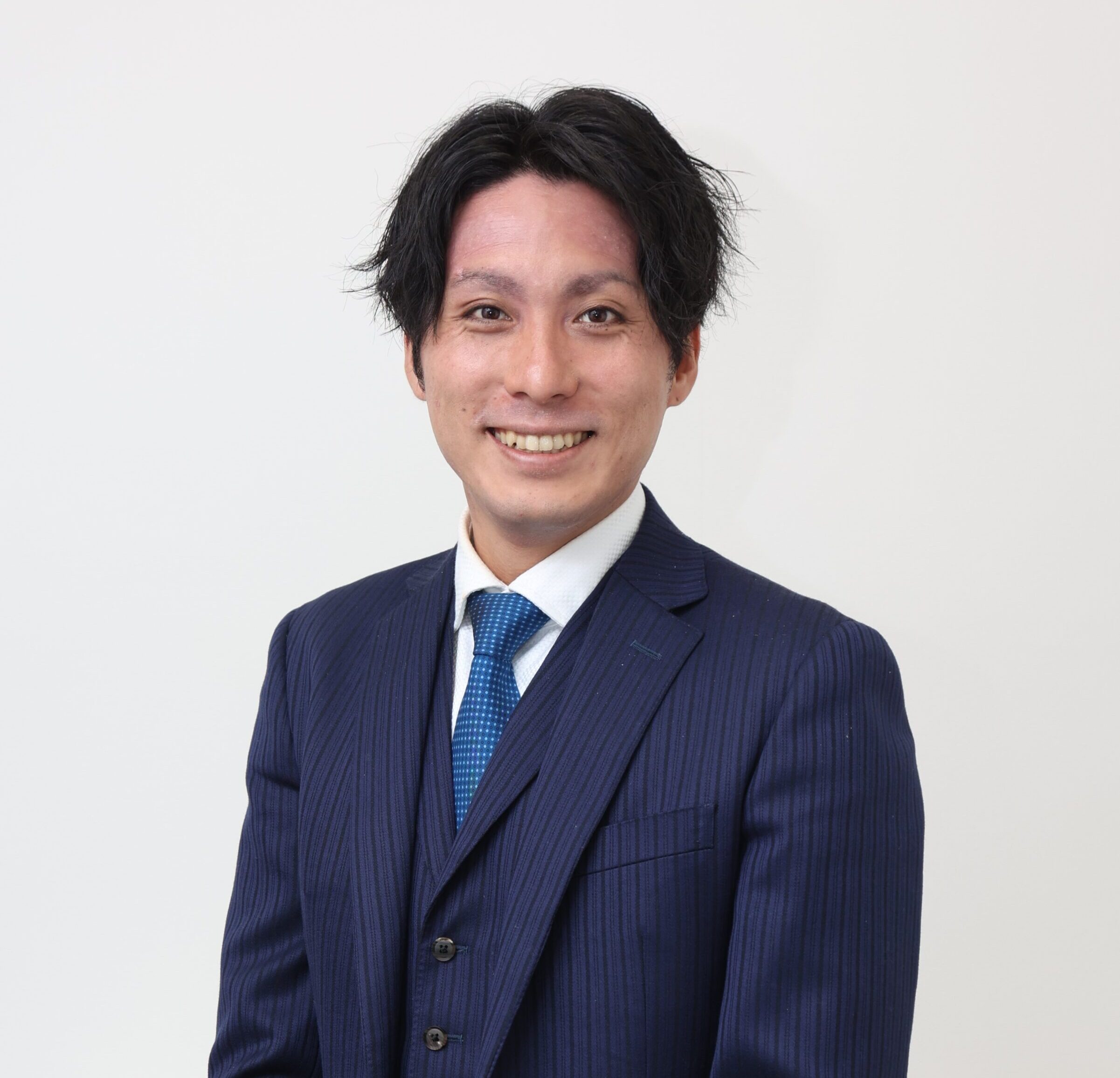 コンサルティング部 副部長 鈴木 哲治(写真)